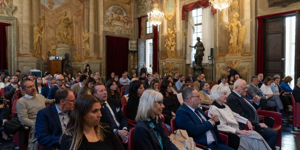 Pubblico seduto nell'aula magna di Balbi V